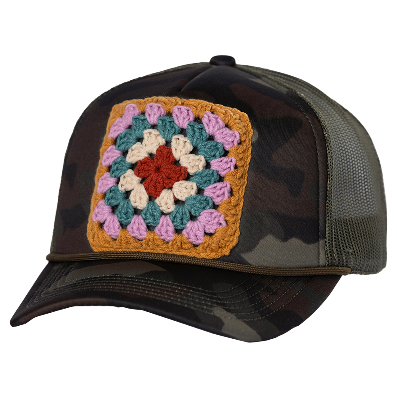 A camouflage trucker hat with a multicolored crochet granny square pattern on the front.